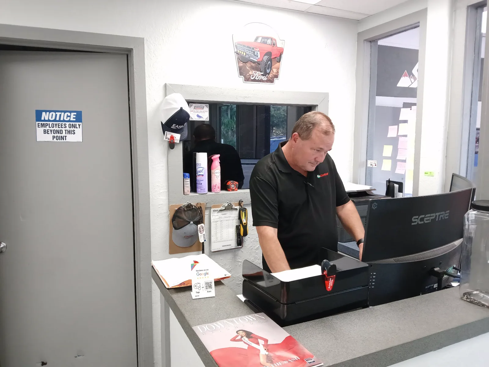 Ben at his desk at Tire Express and Complete Auto Service in Ocala