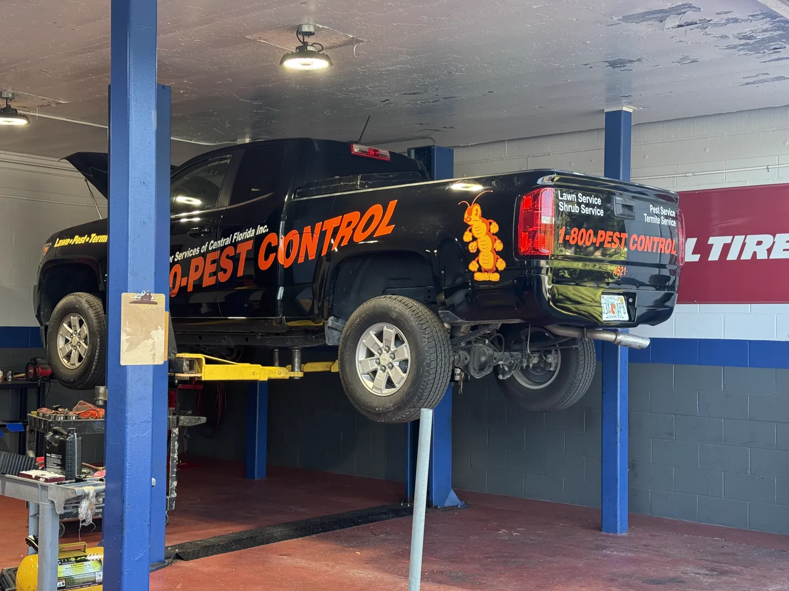 Fleet truck on the lift for service at Tire Express in Ocala